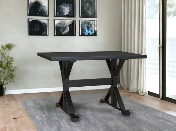 Homeroots 48" Black Solid Wood Trestle Base Dining Table   517855
