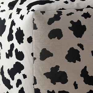 Homeroots 17" Black And White Twill Cow Print Pouf Ottoman   518259