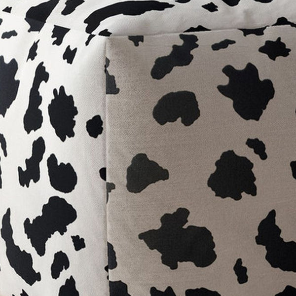 Homeroots 17" Black And White Twill Cow Print Pouf Ottoman   518259