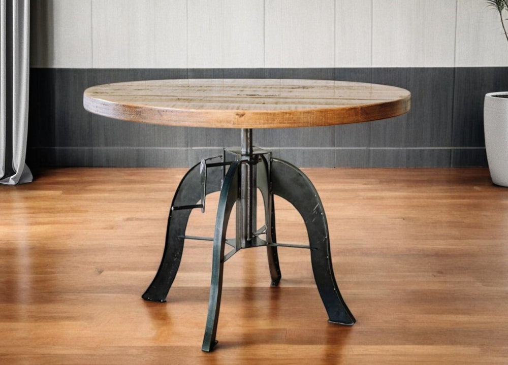 HomeRoots 36" Rustic Brown and Black Round Solid Wood Dining Table with Steel Crank Pedestal Base Design 518610