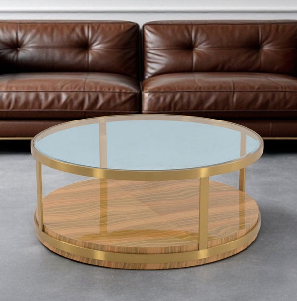HomeRoots 43" Clear Glass Round Coffee Table with Gold-Brown Wood & Metal Base, Elegant Design & Shelf Storage 520588
