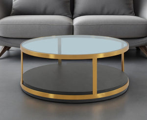 HomeRoots 43" Clear Glass Round Coffee Table with Black and Gold Metal Base and Wood Shelf for Modern Spaces 520591