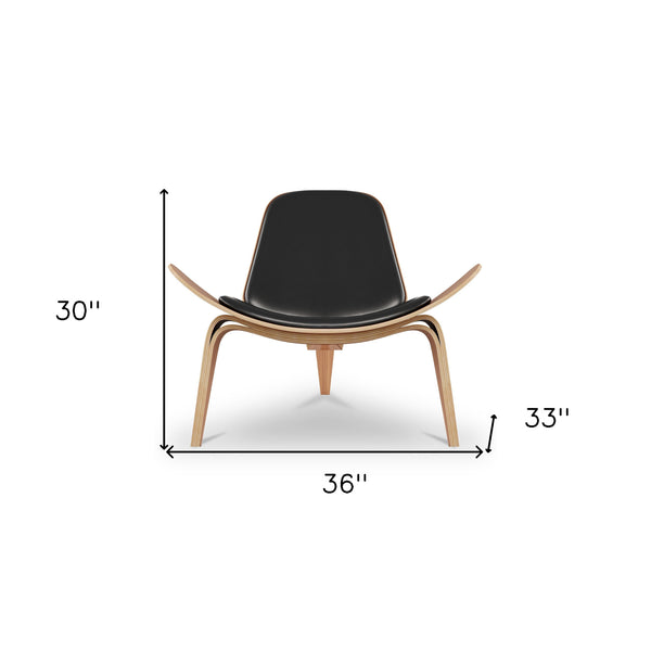 Homeroots 36" Black And Wood Brown Faux Leather Lounge Chair   520601