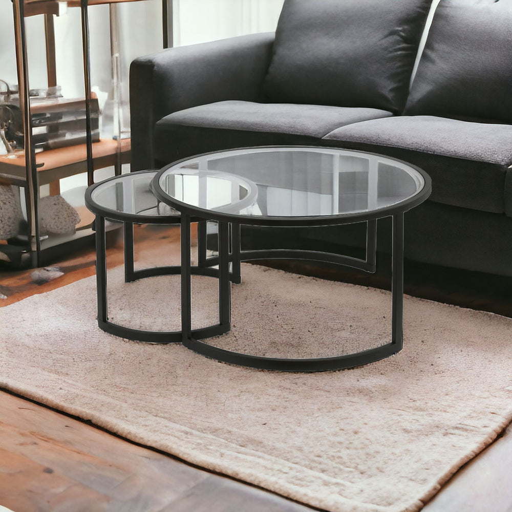 Homeroots Set Of Two 36" Black Glass And Steel Round Nested Coffee Tables   520912