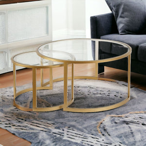 Homeroots Set Of Two 36" Gold Glass And Steel Round Nested Coffee Tables   520914
