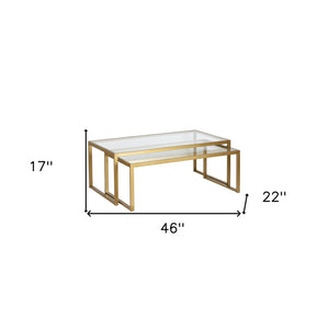 Homeroots Set Of Two 46" Gold Glass And Steel Nested Coffee Tables   520920