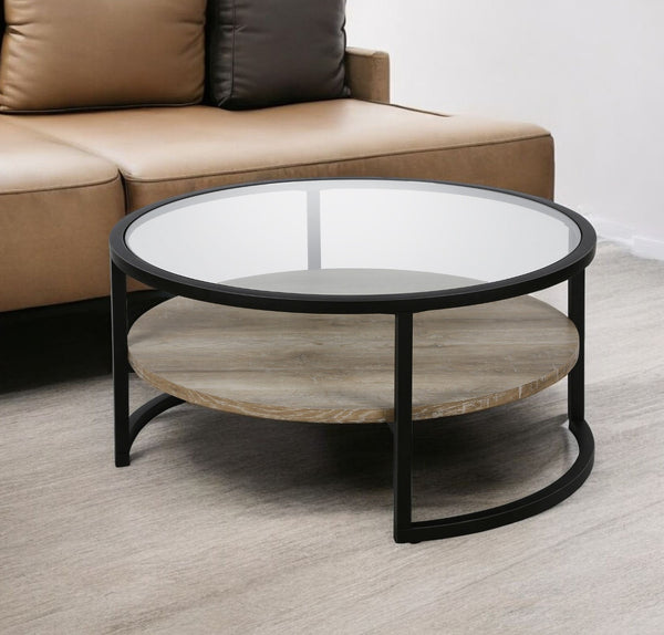 Homeroots 34" Black Glass And Steel Round Coffee Table With Shelf   520925