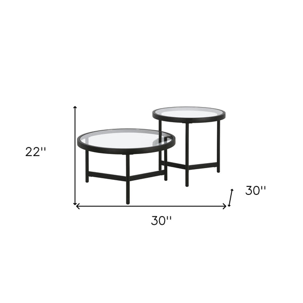 Homeroots Set Of Two 30" Black Glass And Steel Round Nested Coffee Tables   520927