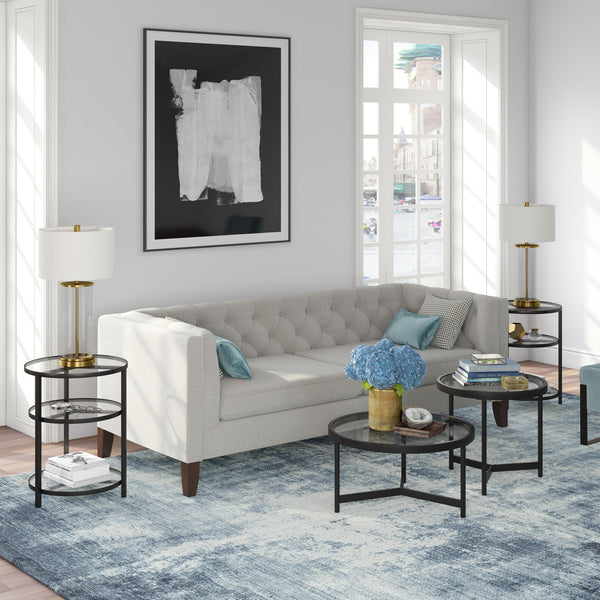 Homeroots Set Of Two 30" Black Glass And Steel Round Nested Coffee Tables   520927