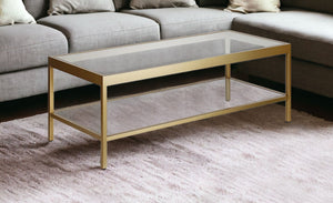 Homeroots 45" Clear Glass And Gold Steel Coffee Table With Shelf   520941