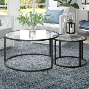 Homeroots Set Of Two 35" Black Glass And Steel Round Nested Coffee Tables   520943