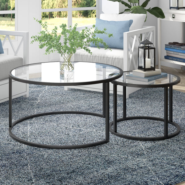 Homeroots Set Of Two 35" Black Glass And Steel Round Nested Coffee Tables   520943