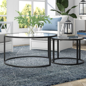 Homeroots Set Of Two 35" Black Glass And Steel Round Nested Coffee Tables   520943