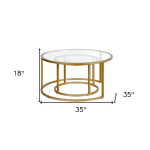Homeroots Set Of Two 35" Gold Glass And Steel Round Nested Coffee Tables   520944