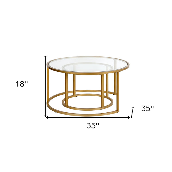 Homeroots Set Of Two 35" Gold Glass And Steel Round Nested Coffee Tables   520944