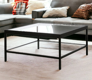 Homeroots 32" Clear And Black Glass And Steel Square Coffee Table With Shelf   520961