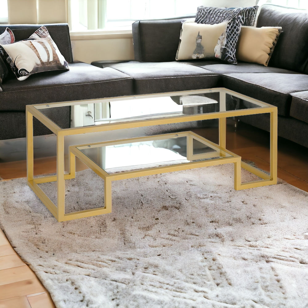 Homeroots 45" Clear And Gold Glass And Steel Coffee Table With Shelf   520965
