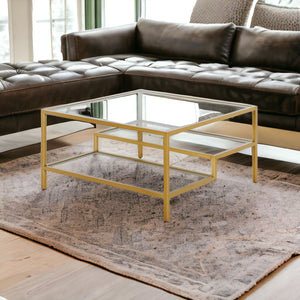Homeroots 32" Gold Glass And Steel Square Coffee Table With Two Shelves   520971