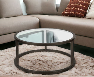 Homeroots 35" Black Glass And Steel Round Coffee Table   520997