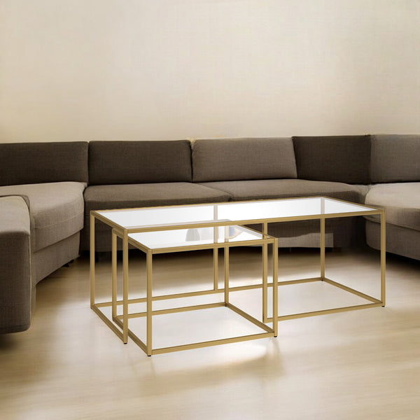 Homeroots Set Of Two 50" Gold Glass And Steel Nested Coffee Tables   521025