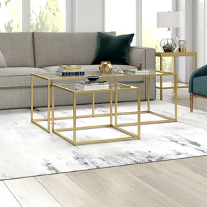 Homeroots Set Of Two 50" Gold Glass And Steel Nested Coffee Tables   521025
