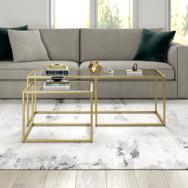 Homeroots Set Of Two 50" Gold Glass And Steel Nested Coffee Tables   521025