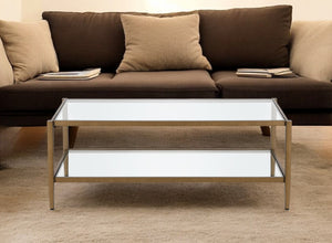 Homeroots 45" Clear And Antiqued Brass Glass And Metal Coffee Table With Shelf   521038