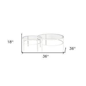 Homeroots Set Of Two 36" White Glass And Steel Round Nested Coffee Tables   521043