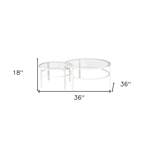 Homeroots Set Of Two 36" White Glass And Steel Round Nested Coffee Tables   521043