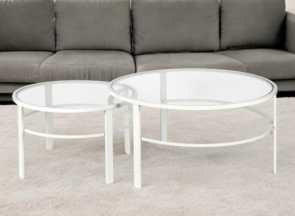 Homeroots Set Of Two 36" White Glass And Steel Round Nested Coffee Tables   521043