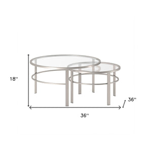 Homeroots Set Of Two 36" Clear And Silver Glass And Steel Round Nested Coffee Tables   521044