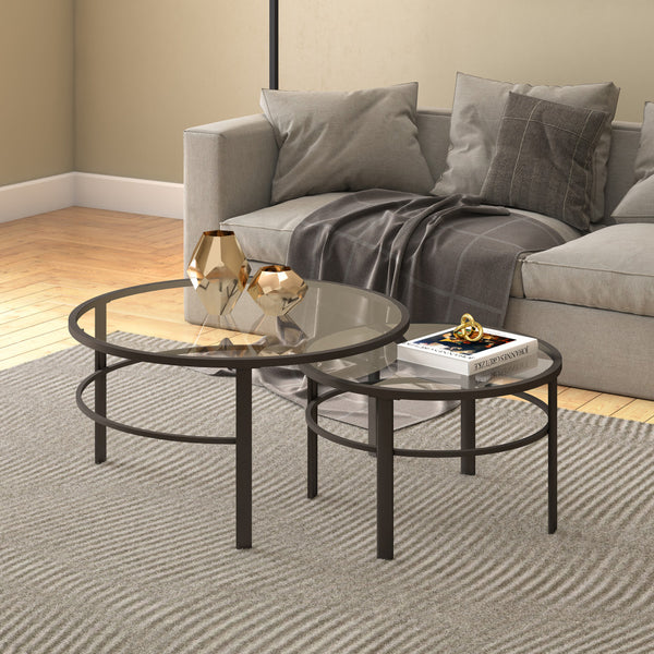 Homeroots Set Of Two 36" Clear And Black Glass And Steel Round Nested Coffee Tables   521045
