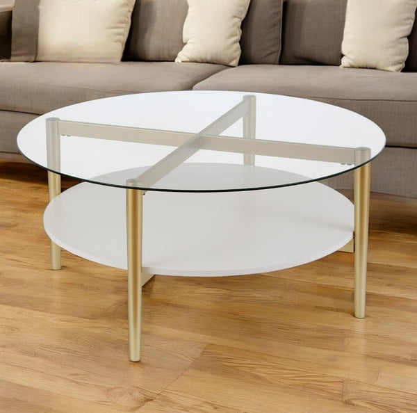 Homeroots 36" Clear And Gold Glass And Steel Round Coffee Table With Shelf   521052