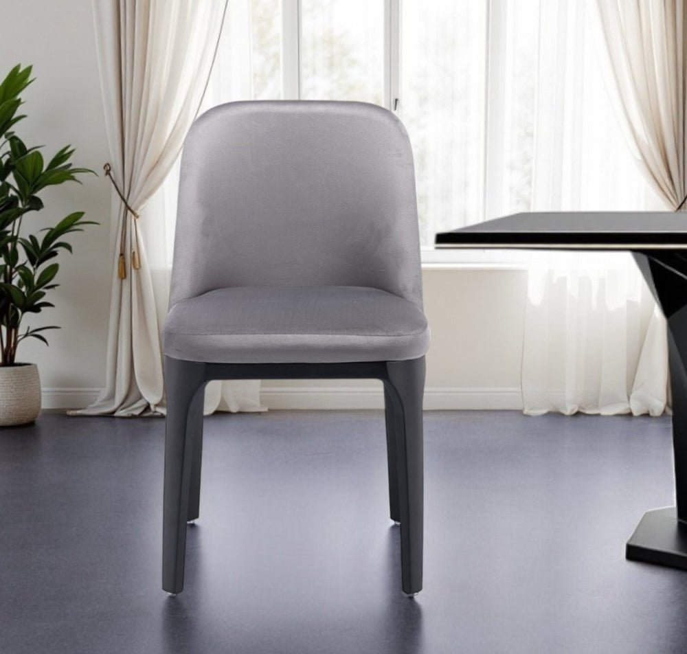 HomeRoots Gray Velvet Upholstered Dining Side Chair - Modern Armless Design with Black Legs for Versatile Comfort 521278