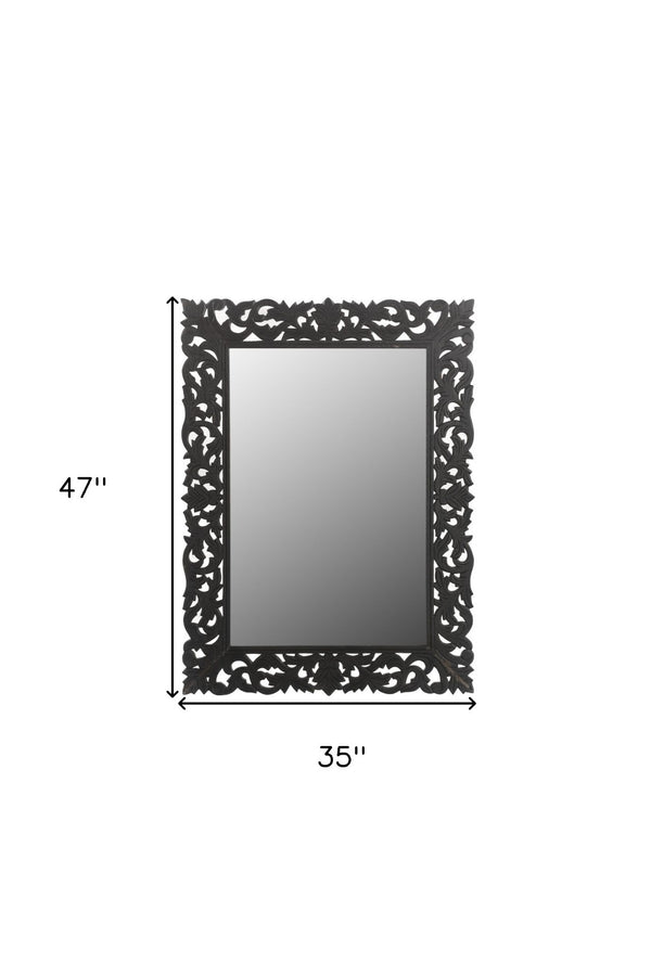 HomeRoots 47" Black Floral Carved Accent Mirror - Handcrafted Solid Wood Frame for Rustic Elegance & Charm 521567
