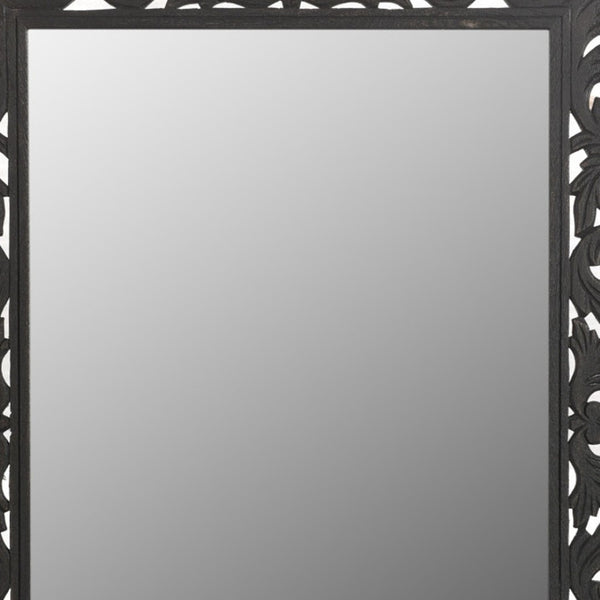 HomeRoots 47" Black Floral Carved Accent Mirror - Handcrafted Solid Wood Frame for Rustic Elegance & Charm 521567