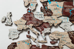 Homeroots 24" X 39" Brown And Beige Wood World Map Hanging Dimensional Sculpture  Plywood 521589