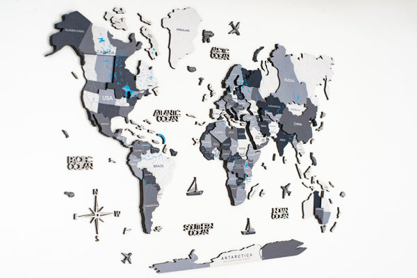 HomeRoots 24" Handcrafted Dimensional Black and Gray World Map Wall Art - Unique Travel-Inspired Decor Piece 521592