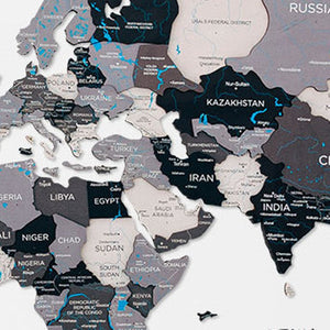 HomeRoots 24" Handcrafted Dimensional Black and Gray World Map Wall Art - Unique Travel-Inspired Decor Piece 521592