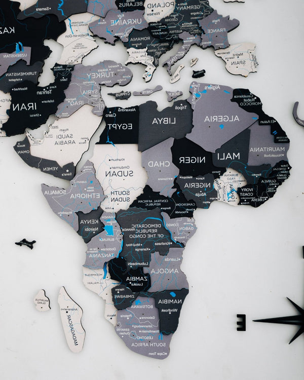 HomeRoots 35" Handcrafted Black, Gray & White World Map Wall Art – Stunning Dimensional Sculpture for Decor 521593
