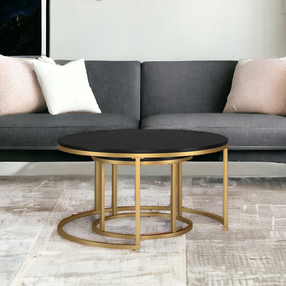 Homeroots Set Of Two 35" Black And Gold Steel Round Nested Coffee Tables   521628