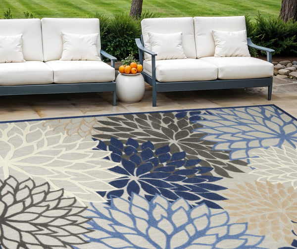 HomeRoots 12' Blue and Ivory Floral Indoor Outdoor Area Rug - Durable, Stain-Resistant, Tropical Charm for Any Space 521648