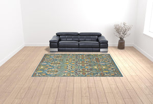 HomeRoots 9' Teal and Gold Floral Power Loom Area Rug - Vibrant, Low-Profile Design Perfect for Any Room 9' X 12' Rectangle 521666