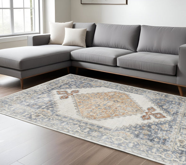 HomeRoots 9' Gray and Gold Floral Medallion Area Rug - Distressed, Washable, Stain-Resistant for Family Spaces 9' X 12' 521712