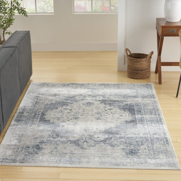 HomeRoots 7' Blue Oriental Power Loom Distressed Area Rug - Timeless Elegance & Easy Care for Any Room 7' X 9' 521729