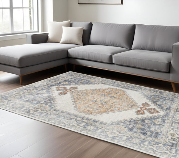 HomeRoots 9' Gray and Gold Floral Medallion Area Rug - Distressed, Washable, Stain-Resistant for Family Spaces 8' X 10' 521740