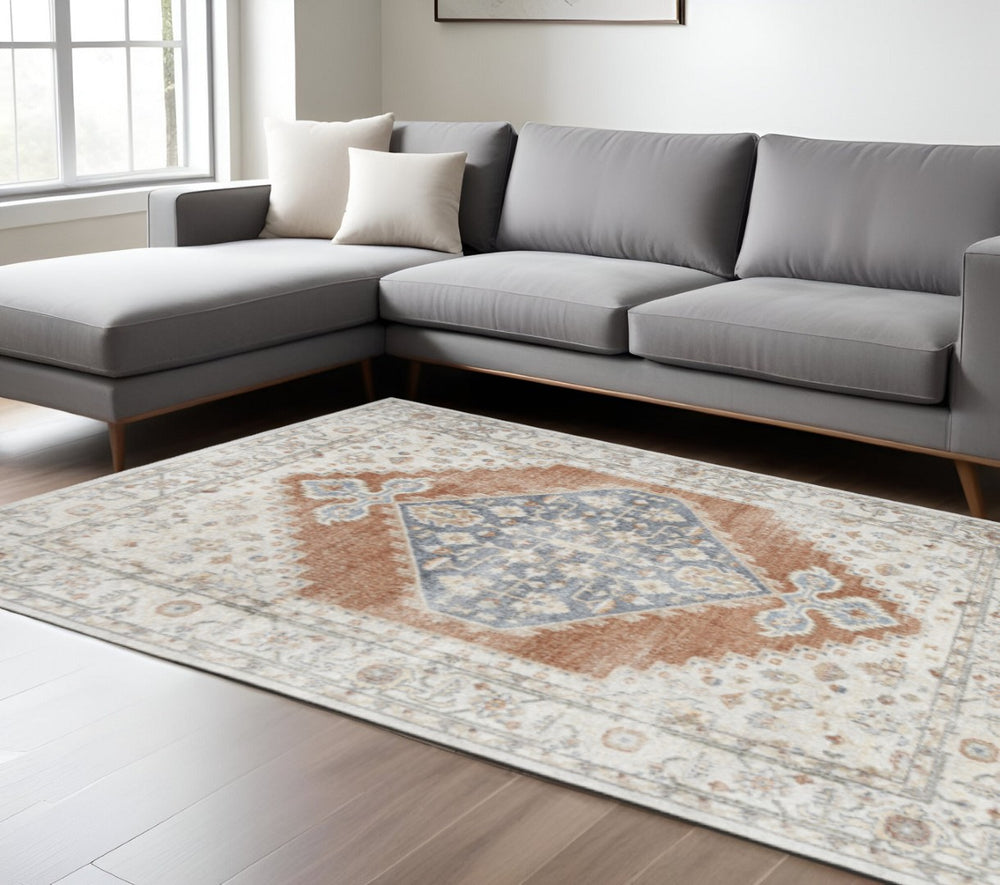 HomeRoots 8' Elegant Floral Medallion Distressed Area Rug in Gray, Orange & Ivory - Washable & Durable Design 8' X 10' 521751