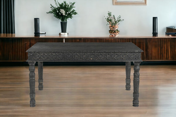 Homeroots 60" Black Solid Wood Dining Table   521836