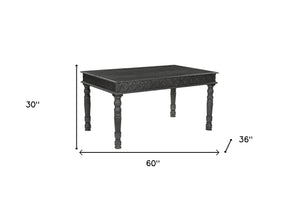 Homeroots 60" Black Solid Wood Dining Table   521836
