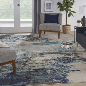 HomeRoots 9' Ivory Abstract Power Loom Area Rug - Modern Durable Design for Living Rooms & Bedrooms 10' X 14' 521890